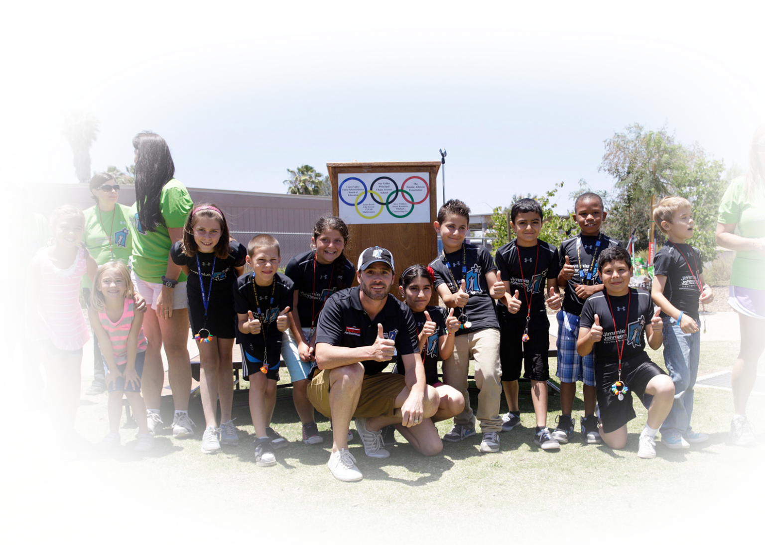 Jimmie Johnson with children at special olympics